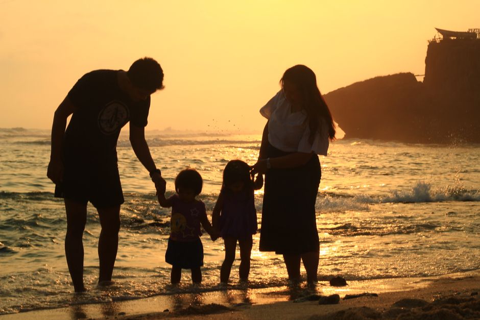description of a family enjoying a meal together, symbolizing the benefits of food stamps