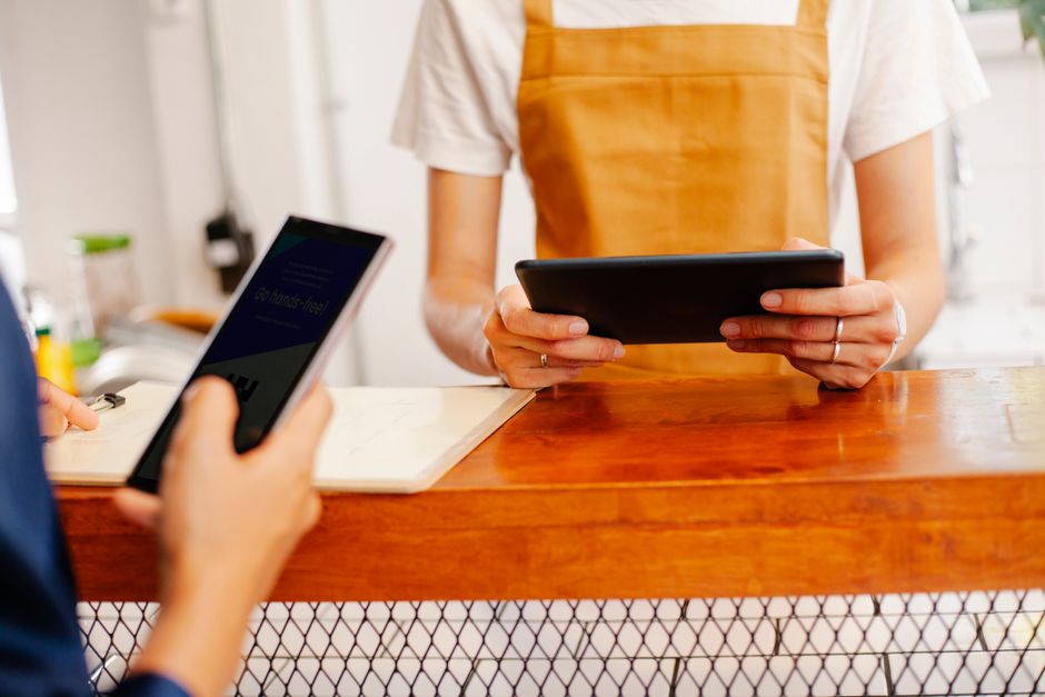 A customer using an EBT card at a Whole Foods Market checkout register