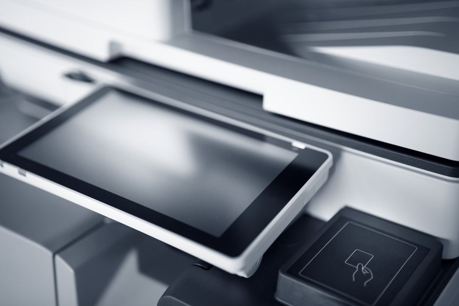 An electronic benefits transfer EBT card being used at a grocery store checkout