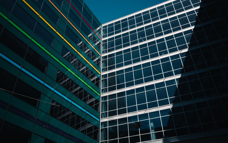An office building of the Georgia Department of Family and Children Services with a clear sign displaying contact information.